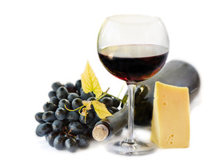 Red wine and grapes