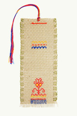 The embroidered bookmark for the book