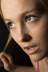 Fototapeta na wymiar Portrait of a young girl close-up