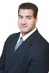 Attractive man in black suit isolated on white