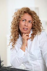 Portrait of businesswoman with thoughtful look