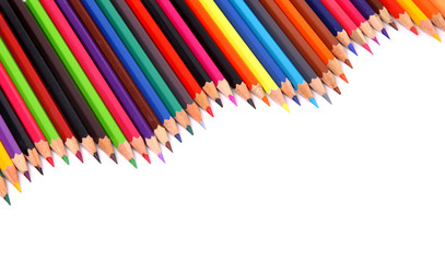 Close up of color pencils with different color over white
