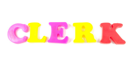 clerk written in fridge magnets on white background