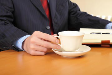 Businessman at office working at his workplace.