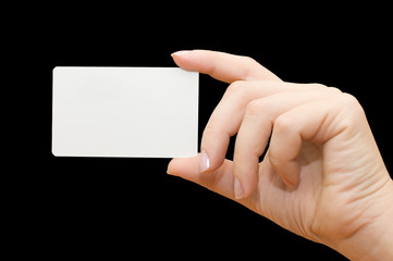 Paper card in woman hand on black background