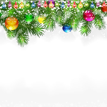 Christmas background with snow-covered branches of Christmas tre