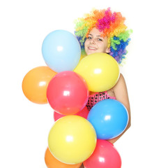 Fototapeta na wymiar funny young woman with colorful balloons over white