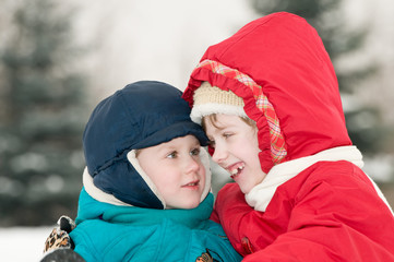 children at snowy winter outdoors