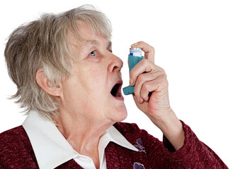 Senior woman with asthma inhaler