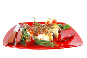 cannelloni served with pepper and tomato