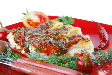 cheese cannelloni served with pepper and tomato
