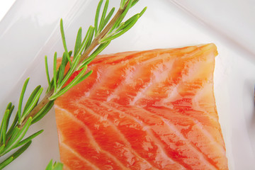 salmon fillet with vegetables and pesto sauce