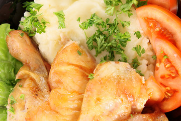 potato, a roast chicken and vegetables.
