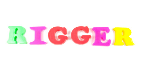 rigger written in fridge magnets on white background