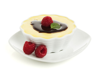 vanilla custard with chocolate topping and raspberries
