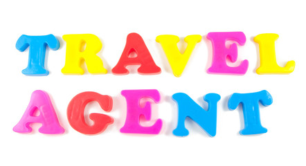 travel agent written in fridge magnets on white background
