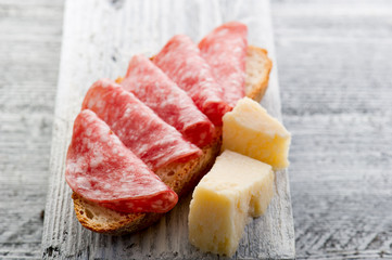 slice bread with parma ham and grana -pane prosciutto grana