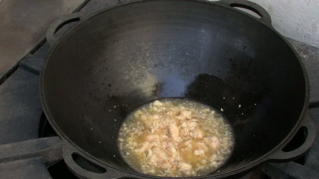 Melting Mutton fat in Cauldron for Pilaf