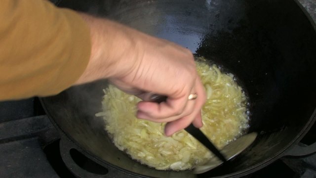 Steam from Frying onion in Wok