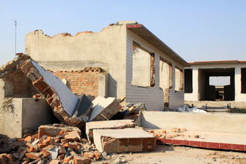 Fototapeta premium demolition of smoldering rubble