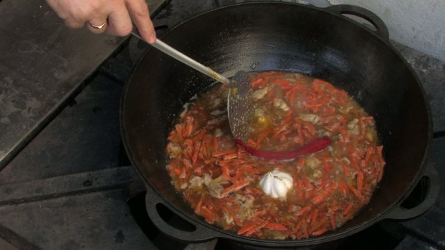 Chili and garlic in Pilaf in Wok, Closeup