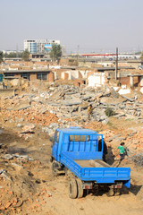 demolition of smoldering rubble