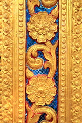Golden Thai carve on temple door