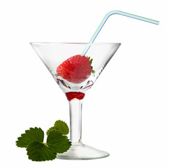 Strawberry leaves and berry with cocktail straw in wineglass