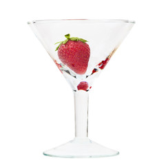Ripe strawberry in glass isolated over white