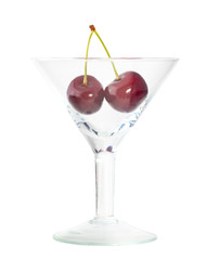 Bunsh of sweet cherry in wineglass