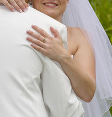 Wedding moments - bride inarm fiance