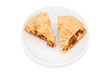 Mushroom pie on plate, isolated on white background