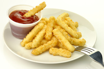 fried potatoes in a white plate