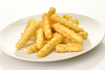 fried potatoes in a white plate