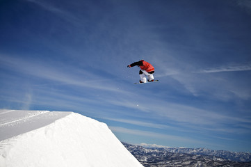 Naklejka na ściany i meble Ekstremalne skoki snowboarder sport, akcja big air