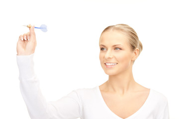 businesswoman throwing a dart