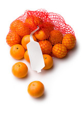 Tangerine in net isolated on white © Sergey Yarochkin