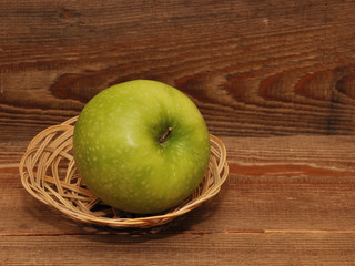ripe apple in basket