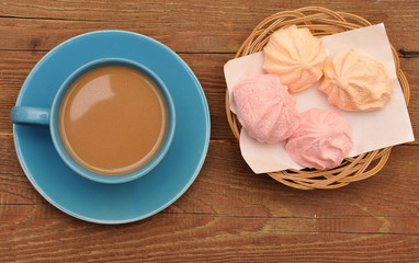 Light breakfast with black coffee and zephyr