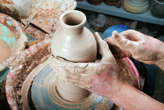 Ceramic bottle on a potter's wheel