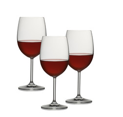 wine glasses with red wine on a white background