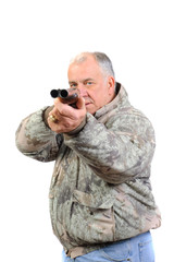 senior hunter pointing shotgun at camera