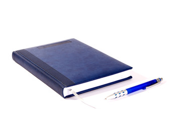 Blue notebook and pen