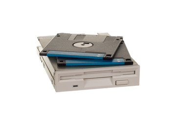 Floppy disk drive with diskettes isolated over white