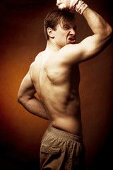 Fighter men showing his biceps