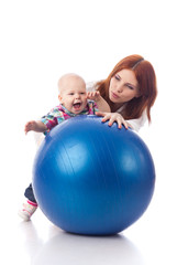 Happy family with  fitness ball.