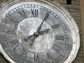 The clock tower of the Palazzo Comunale with the Cortona.
