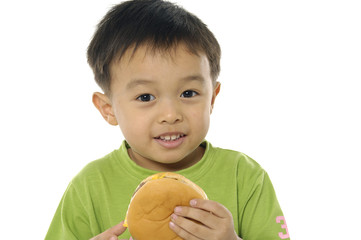 Little boy holding healthy bread