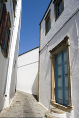 White house and blue sky in Patmos - Pedestrian street of Chora