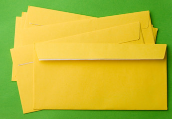 Envelopes isolated on green